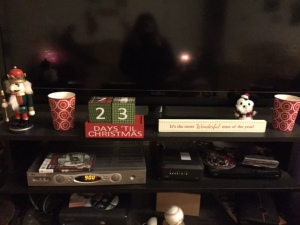 Our makeshift mantle on our TV stand 